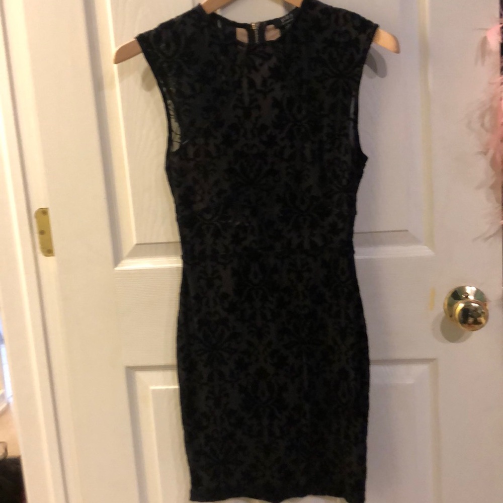 little sheer black dress